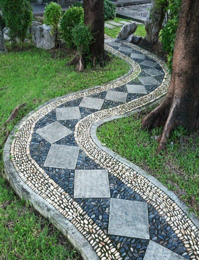 curved mosaic pathway backyard landscaping