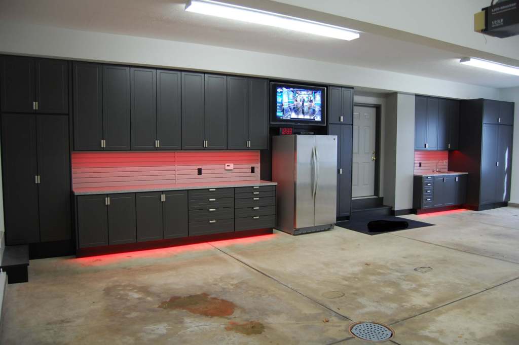 garage design with concrete garage floor and garage storage or garage cabinet