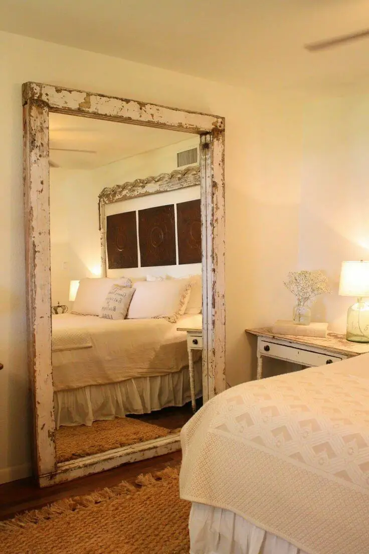Rustic bedroom decor - Large Rustic Mirror Next to the Bed