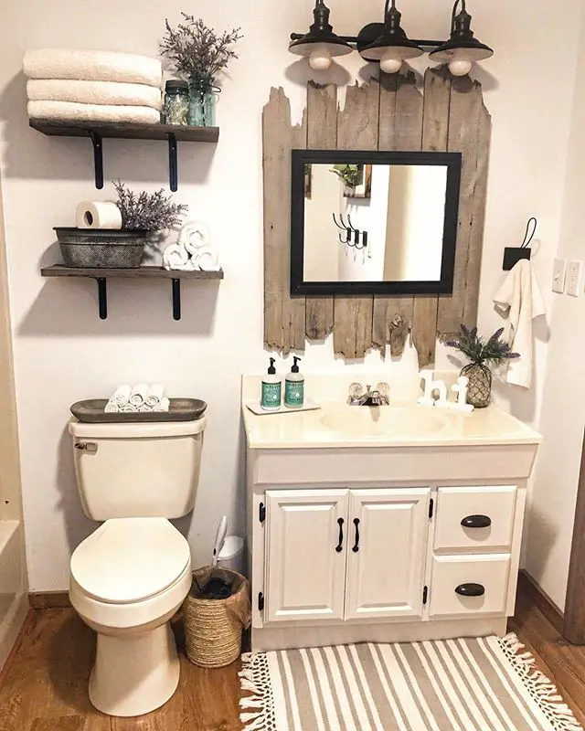 Clean White rustic bathroom with wood wall accents