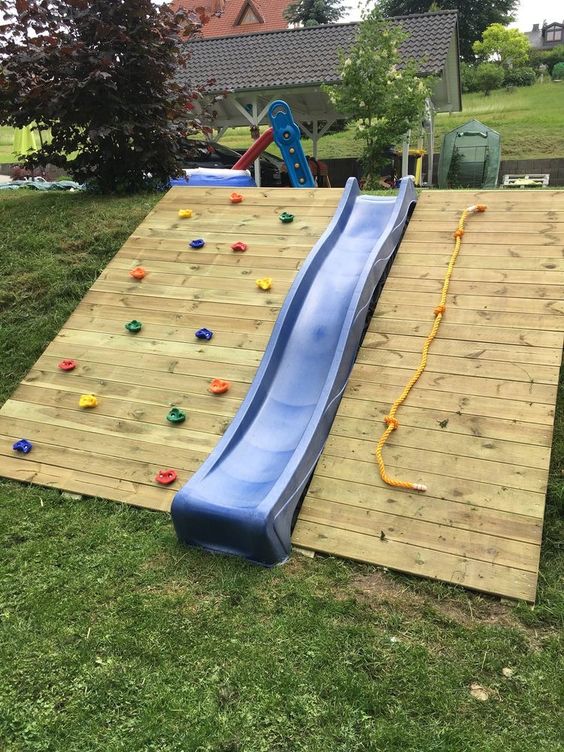 Rock Climbing with Slide - Backyard Playground landscaping ideas